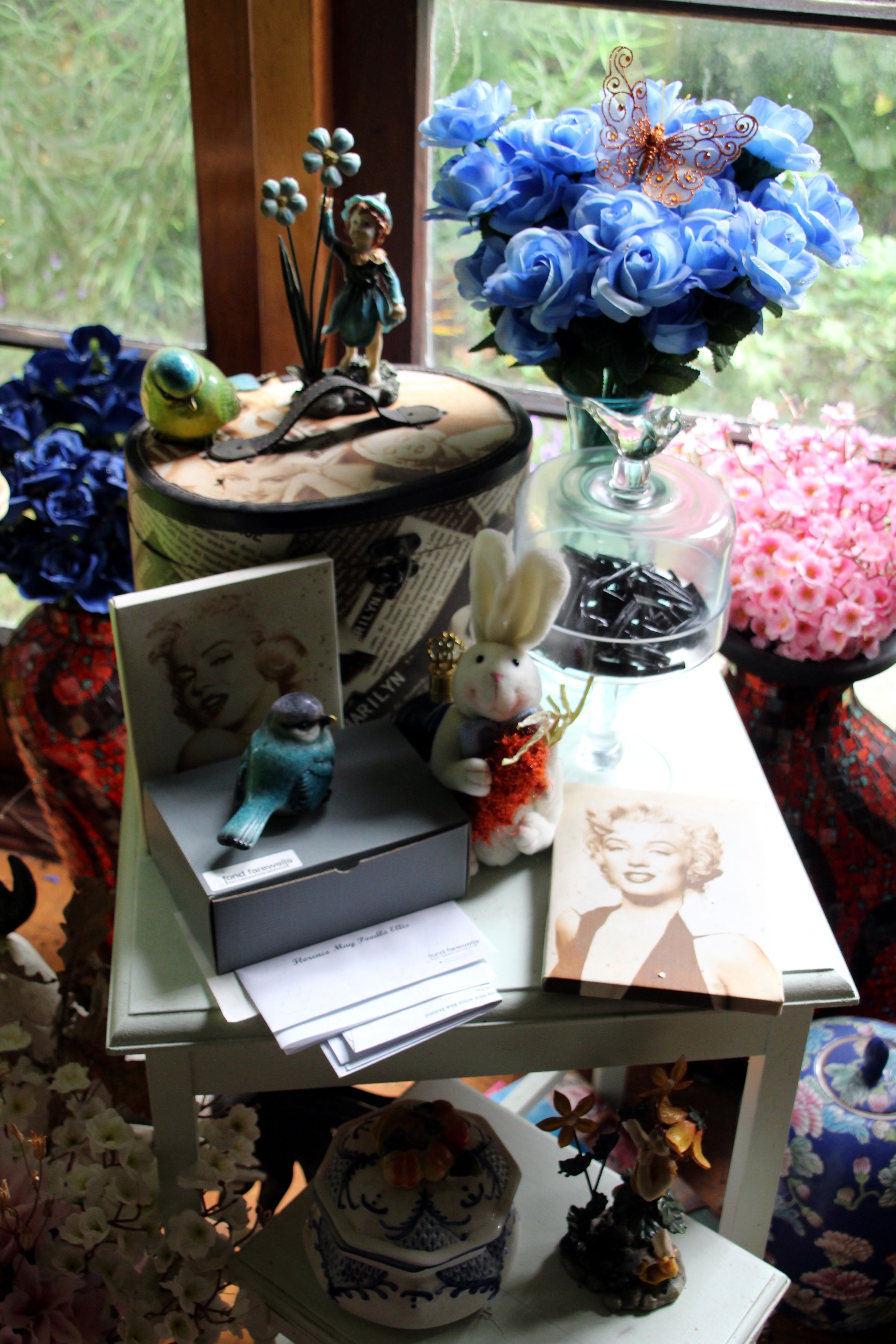 Bunches of fake flowers add more colour to Peter’s already colourful living space.