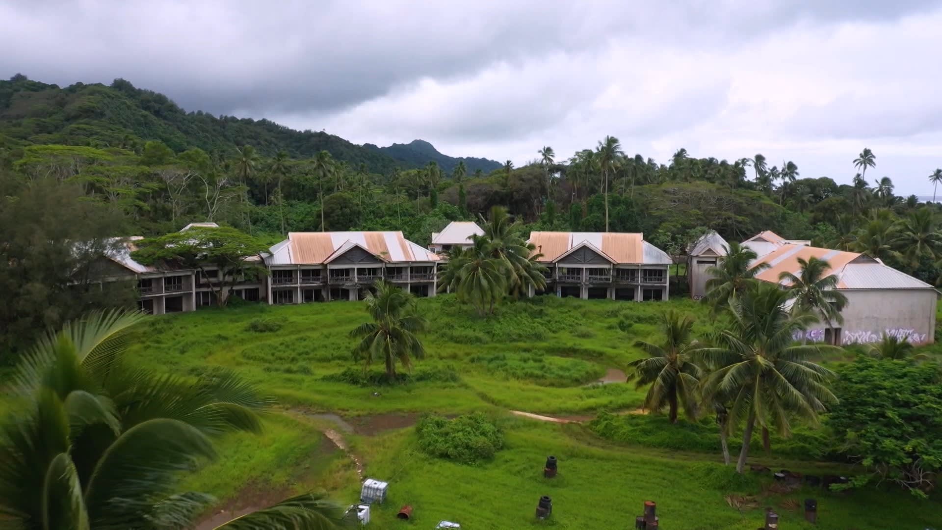 The Sheraton Hotel in its current overgrown and derelict state